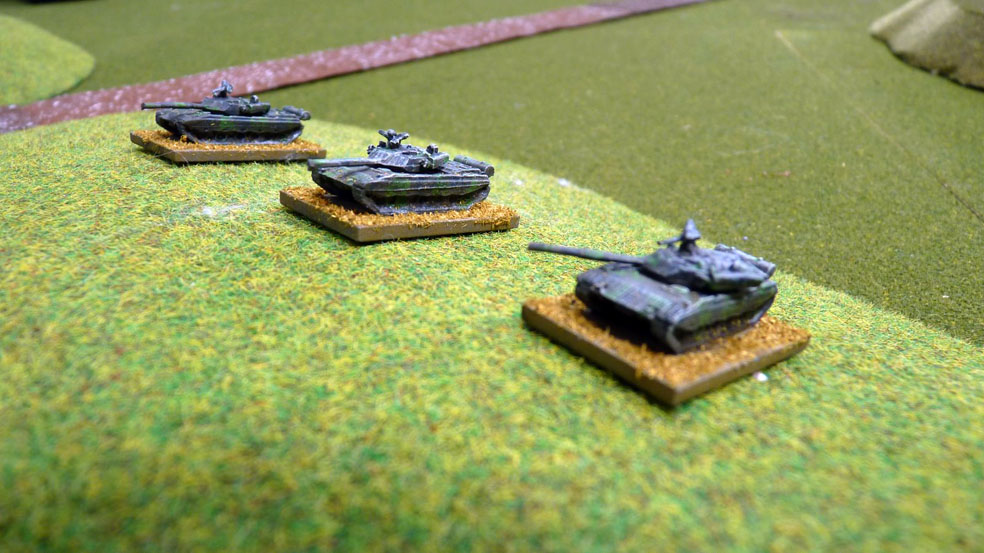 Chinese tanks take up hull down positions